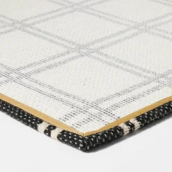 1'6"x2'6" Indoor/Outdoor Plaid Scatter Halloween Doormat Black/White - Hyde & EEK! Boutique™ -Halloween Decoration Store GUEST 61fba789 c646 4b6a 8307 45e32a6f8042